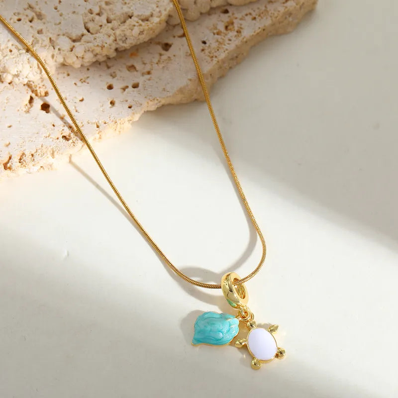 Goudkleurige Ketting met Schildpad & Schelp